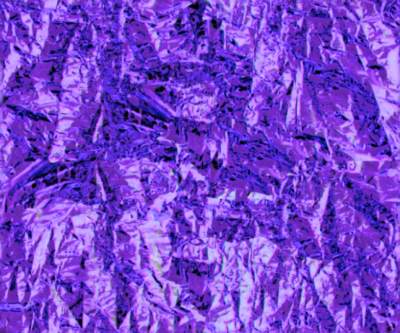 Ultraviolet metal foil seamless repeating background image